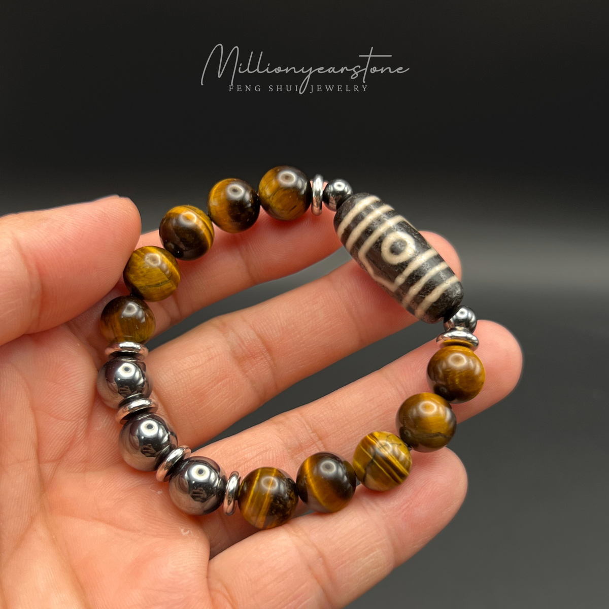 Tibetan Feng shui bracelet - Tiger's Eye 10mm with Three-Eye Dzi charm