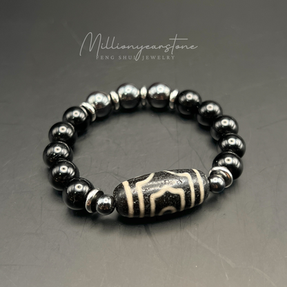 Tibetan Feng Shui bracelet - Black Obsidian 10mm with Three Eye Dzi charm