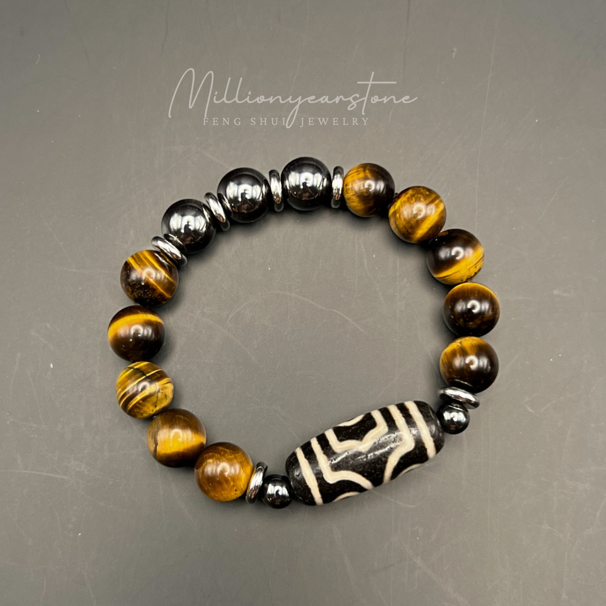 Tibetan Feng shui bracelet - Tiger's Eye 10mm with Three-Eye Dzi charm