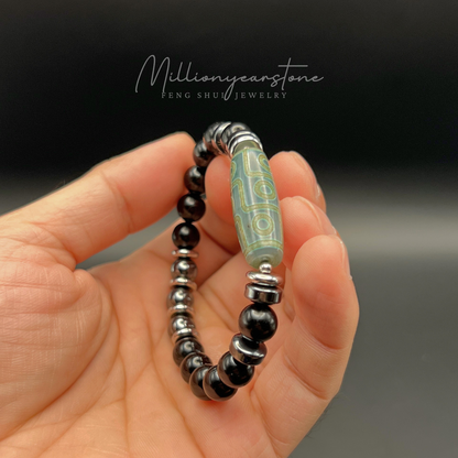 Feng Shui Tibetan bracelet - Nine-Eye Dzi charm, Black Obsidian 8mm